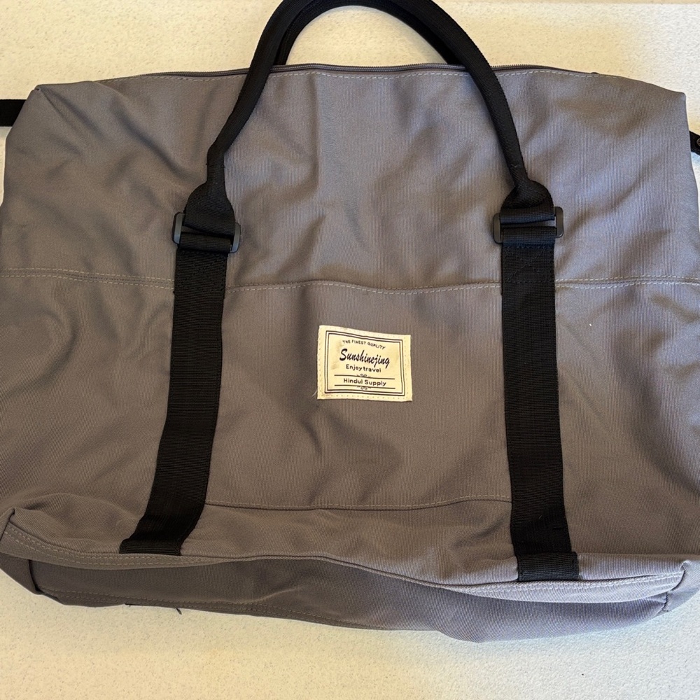 Sleek Gray Duffel Bag by